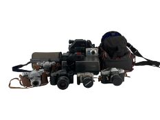 Various vintage and later cameras including Kodak Retina Reflex SLR