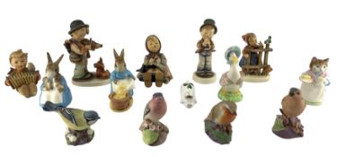 Five Hummel figures including child musicians etc