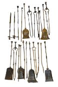 Large collection of 18th/19th century steel and brass fire irons