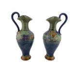 Pair of Royal Doulton stoneware ewers possibly by LF Bowen