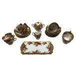 Royal Chelsea Golden Rose pattern tea set comprising eight cups and saucers