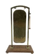 Brass rectangular gong on oak platform base H83cm