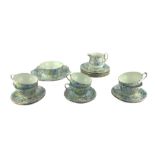 Shelley Melody pattern tea set decorated with flowers comprising six cups and saucers