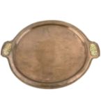 Arts and Crafts oval copper tray attributed to Edward Spencer with pierced brass trailing leaf handl