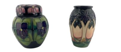 Small Moorcroft ginger jar and cover designed by Sally Tuffin and decorated with the Violet pattern