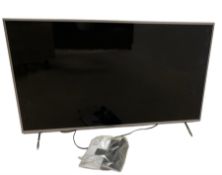 Panasonic CX700 40" smart TV with remote