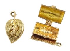 Two 9ct gold pendant/charms including snug as a bug in a rug and ladybird on a leaf