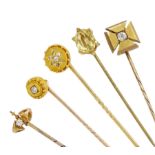 Four Victorian gold diamond stick pins including flower cluster and single stone cross of approx 0.1