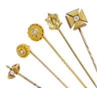 Four Victorian gold diamond stick pins including flower cluster and single stone cross of approx 0.1