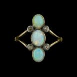 Early 20th century gold three stone opal and four stone diamond ring