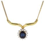 14ct gold oval sapphire and round brilliant cut diamond cluster pendant necklace