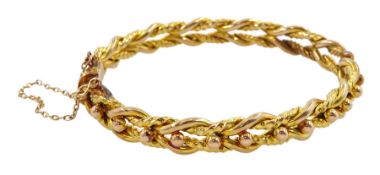 Early 20th century gold knot link and bead bangle