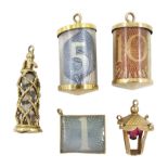 Five 9ct gold pendant/charms including soda stream