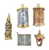 Five 9ct gold pendant/charms including soda stream