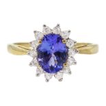 9ct gold oval tanzanite and cubic zirconia cluster ring