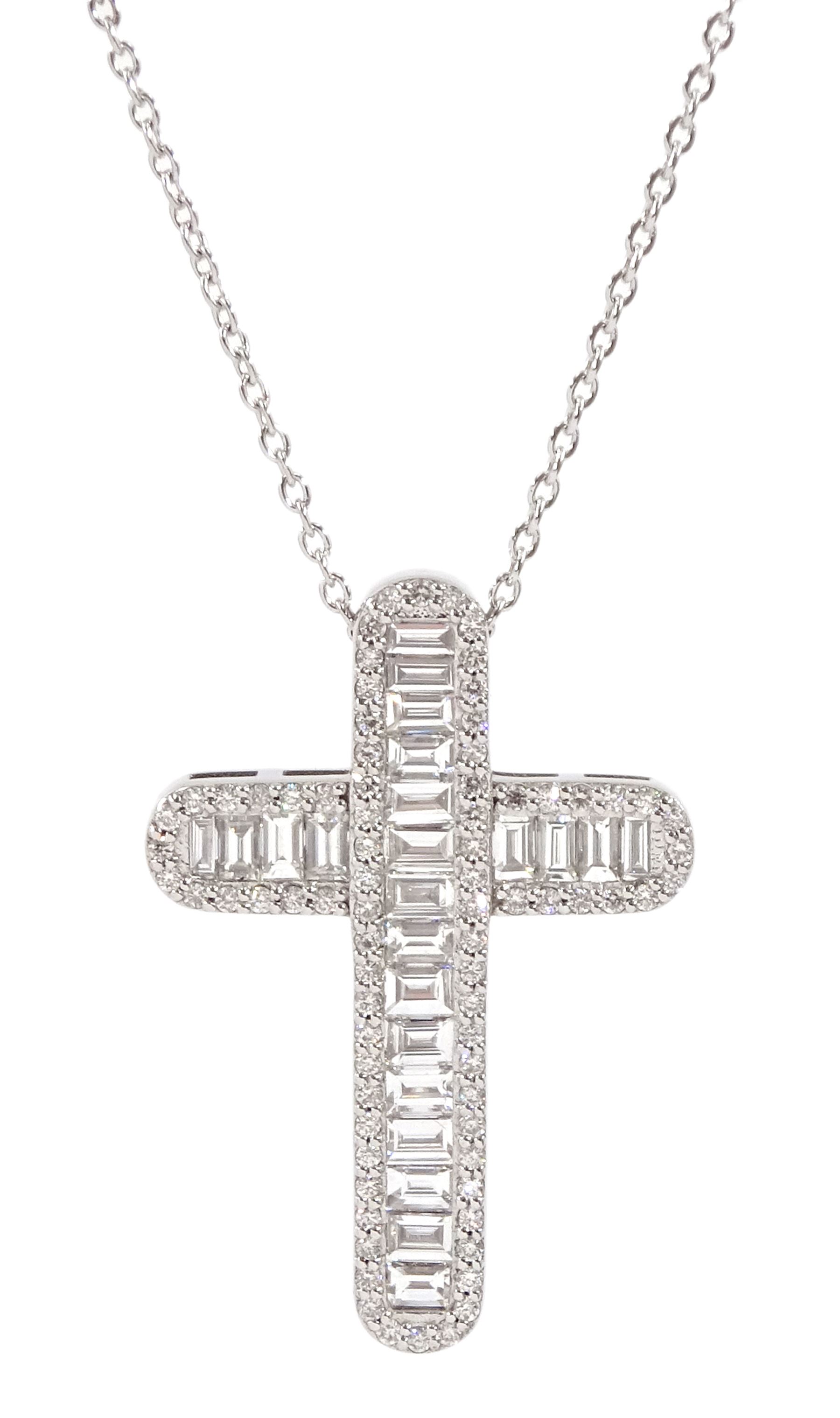 18ct white gold baguette cut and round brilliant cut diamond cross pendant