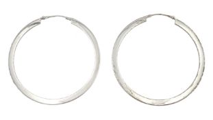 Pair of white gold hoop earrings