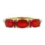 9ct gold three stone oval fire opal ring