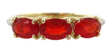 9ct gold three stone oval fire opal ring