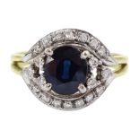 14ct gold oval cut sapphire and round brilliant cut diamond cluster ring