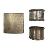 Engine turned square silver powder compact with interior mirror London1946 and two silver serviette