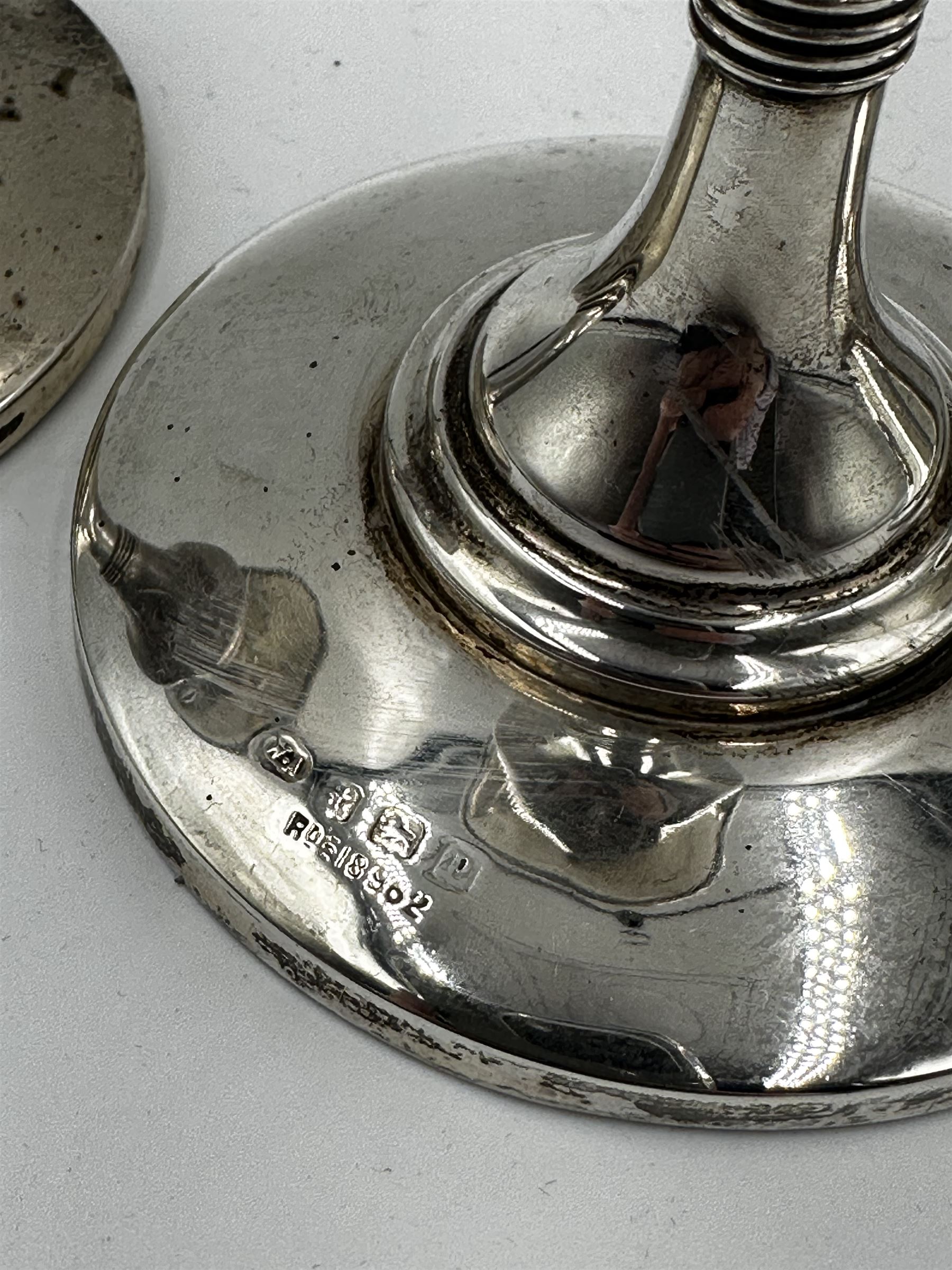 Pair of silver candlesticks of panel sided design on a circular foot H10cm Birmingham 1939 - Image 2 of 2