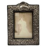 Edwardian upright silver photograph frame with embossed floral decoration