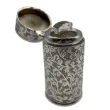 Edwardian silver cylindrical scent flask engraved with scrolls and trailing leaves