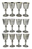 Set of twelve silver goblets with gilded interiors