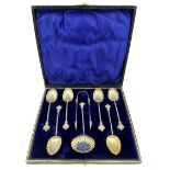 Set of six silver coffee spoons with gilded shell shape bowls