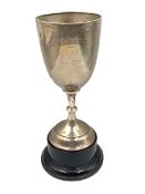 Silver challenge cup inscribed 'Stores Dpt. GPO' on wooden plinth H28cm overall London 1912 6.4oz