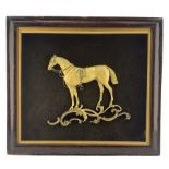 Victorian gilt metal plaque of a saddled horse on fabric background