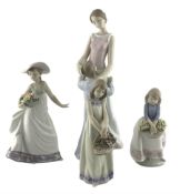 Large Lladro figure 'Someone to look up to' No.6771 and three smaller Lladro figures 'Carefree' No.5