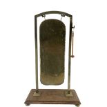 Early 20th century brass rectangular gong on oak platform base