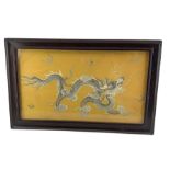Chinese silk work panel embroidered in relief with a dragon