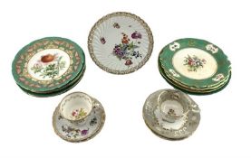 19th century English porcelain plate with panels of flower and fruit sprays reserved on a green grou