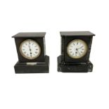 Two French 8-day mantle clocks - in Belgium slate cases with enamel dials