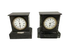 Two French 8-day mantle clocks - in Belgium slate cases with enamel dials