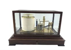 Modern barograph in a mahogany case with bevelled glass sides and fitted with a single drawer