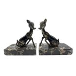 Pair of Art Deco style patinated spelter bookends cast as fawns on marbled bases