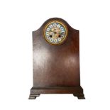 French clock movement in a wooden case.