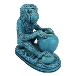 Burmantofts Faience turquoise-glaze model of a monkey