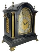 Edwardian - English ebonised 8-day bracket clock in a break arch case with flambe finials and reeded