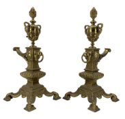 Pair of late Victorian cast and gilt brass fire dogs
