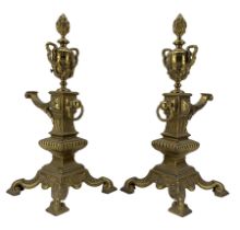 Pair of late Victorian cast and gilt brass fire dogs