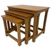 Mouseman - nest of three oak occasional tables
