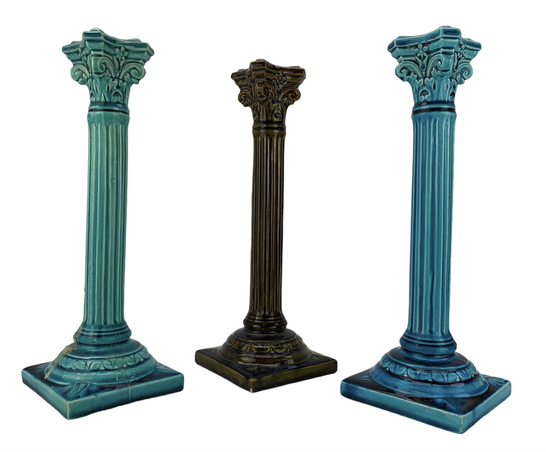 Pair of Burmantofts turquoise-glaze corinthian column candlesticks
