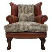 Traditionally shaped wingback club armchair