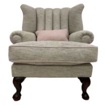 Traditionally shaped wingback armchair