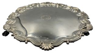 Victorian silver salver circular form with pie crust border and scroll and shell detail